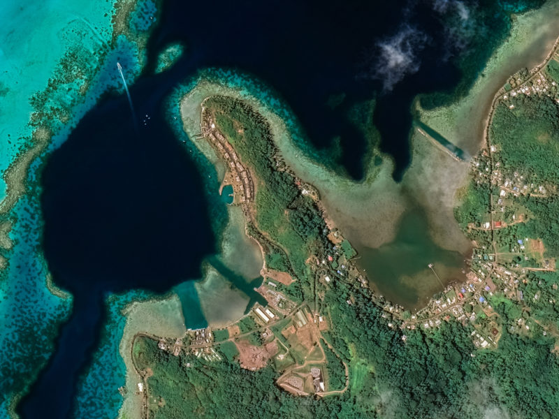 Blog Landscape of the coast of the resort island of Bora Bora from a bird's eye view with turquoise water and sandy beaches